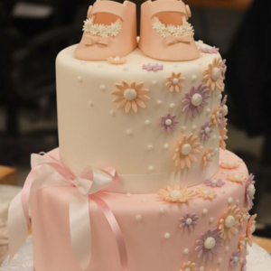 2 Tiered Baby Shower Cake With Sugar Flowers And Baby Shoes cake ordered online in Kathmandu, Nepal